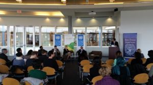 Students and Staff discussing human development report