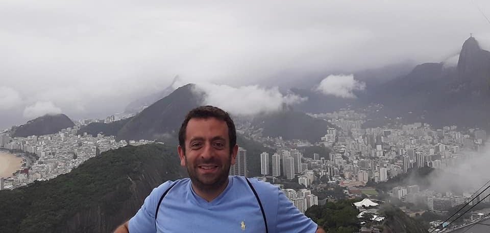 Ben Weinberg on a mountain top.