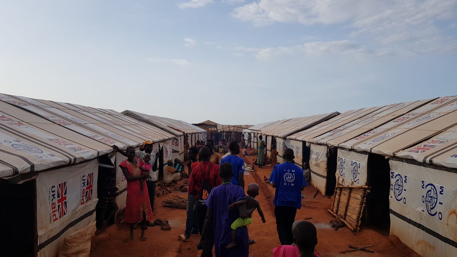 People walk through a refugee camp in South Sudan.
