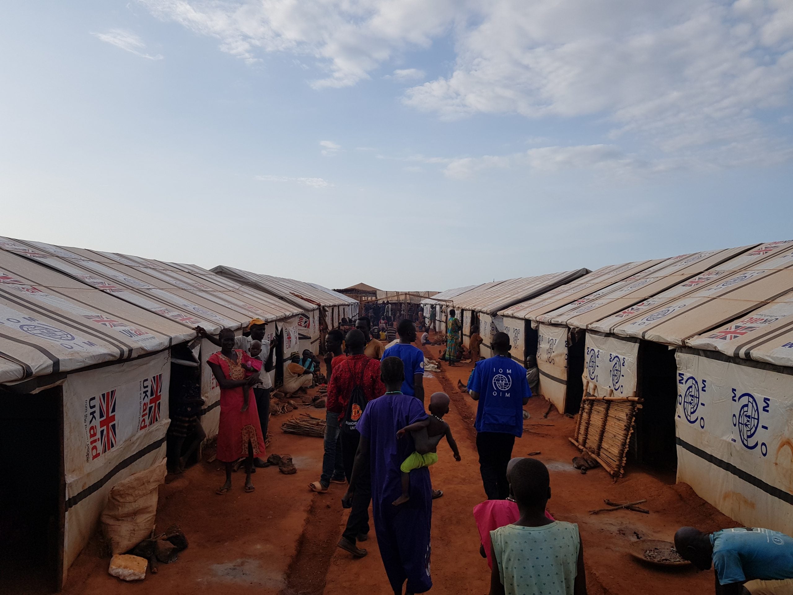 People walk through a refugee camp in South Sudan.